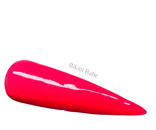 Bikini Babe is a nail dip powder of a vibrant red hue. 